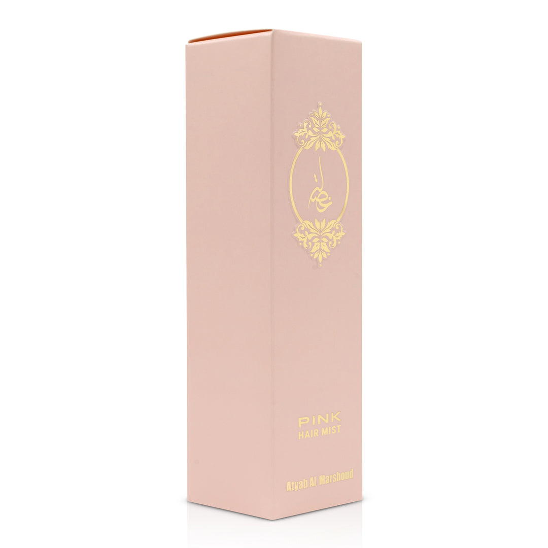 Angled view of the pink body essence box showing its rectangular shape and gold printed design.